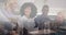 Composite of happy diverse colleagues clapping at meeting, and modern cityscape