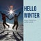 Composite of hello winter text and caucasian friends with arms outstretched jumping on snowy land