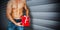 Composite image of attractive bodybuilder with gifts