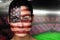 Composite image of beautiful america fan in face paint