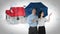 Composite image of businessman and businesswoman holding an umbrella