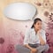 Composite image of businesswoman sitting cross legged thinking with speech bubble