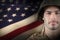 Composite image of close up of confident soldier wearing hard hat