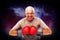 Composite image of close-up portrait of a determined senior boxer