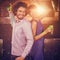 Composite image of cute couple dancing together on dance floor while having drink