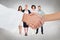 Composite image of extreme closeup of a doctor and patient shaking hands