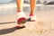 Composite image of fit woman walking on the beach