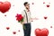 Composite image of geeky hipster offering bunch of roses