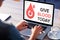 Composite image of give blood today text with icons on screen