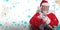 Composite image of happy santa claus messaging with mobile phone