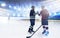 Composite image of ice hockey players shaking hands at rink