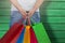 Composite image of midsection of man carrying colorful shopping bag against white background