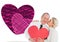 Composite image of older affectionate couple holding red heart shape