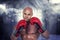 Composite image of portrait of bald boxer in red gloves