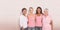 Composite image of portrait of happy women supporting breast cancer social issue