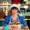 Composite image of portrait of waitress holding tray with doughnuts