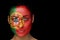 Composite image of portugal football fan in face paint