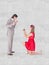 A Composite image of pretty hipster on bended knee doing a marriage proposal to her boyfriend