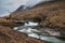 Composite image of red deer stag in Stunning Winter landscape image of River Etive and Skyfall Etive Waterfalls in Scottish