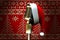 Composite image of retro microphone with santa hat