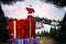 Composite image of santa standing on giant present