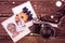 Composite image of smiling brunette getting a mud treatment facial beside bowl of flowers