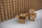 Composite image of stack of brown cardboard boxes