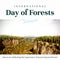 Composite of international day of forests text and scenic view of lush trees growing on landscape