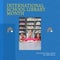 Composite of international school library month text and diverse teacher and girls reading books