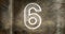 Composite of number 6 against rusty metallic background, copy space