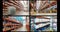 Composite of views from four security cameras in different areas at commercial warehouse