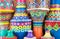 Composition of artistic painted clorful handcrafted pottery vase