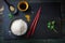 Composition with asian food - rice for sushi, spices, sauces and chopsticks