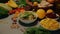 Composition with assorted organic food products on wooden kitchen table