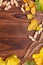 Composition of autumn vegetables on a brown wooden background