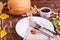 Composition of autumn vegetables on a brown wooden background