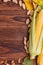 Composition of autumn vegetables on a brown wooden background