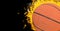 Composition of basketball on fire over black background with copy space