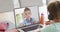 Composition of caucasian schoolboy on laptop online learning with caucasian schoolboy