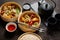 Composition of chinese food. Mixed kinds of dumplings from wooden bamboo steamer