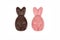 Composition of chocolate figurines. Chocolate bunny. Chocolate eggs on a white background. Place for the test