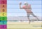 Composition of coloured tier list and grid over american football player in action catching ball