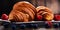 Composition with croissants and fruits on the table