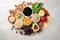 Composition with different superfoods on light background, top view, Selection of healthy rich fiber sources vegan food for
