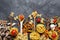 Composition of different varieties of pasta and cherry tomatoes, spices on a black background. top view.