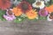 Composition of flowers on wooden background