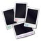 Composition of four blank vintage photo frames on white fone