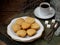 The composition of the gluten-free rice-banana muffin, a cup of coffee and a bouquet of lavender. Romantic breakfast. Vintage phot