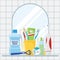 Composition of items for cleaning teeth and oral care. The concept of the bathroom with a mirror and the reflection in the mirror