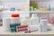 Composition of medicine bottles and pills with pharmacy store